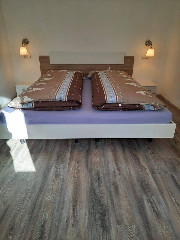 Extra large double bed